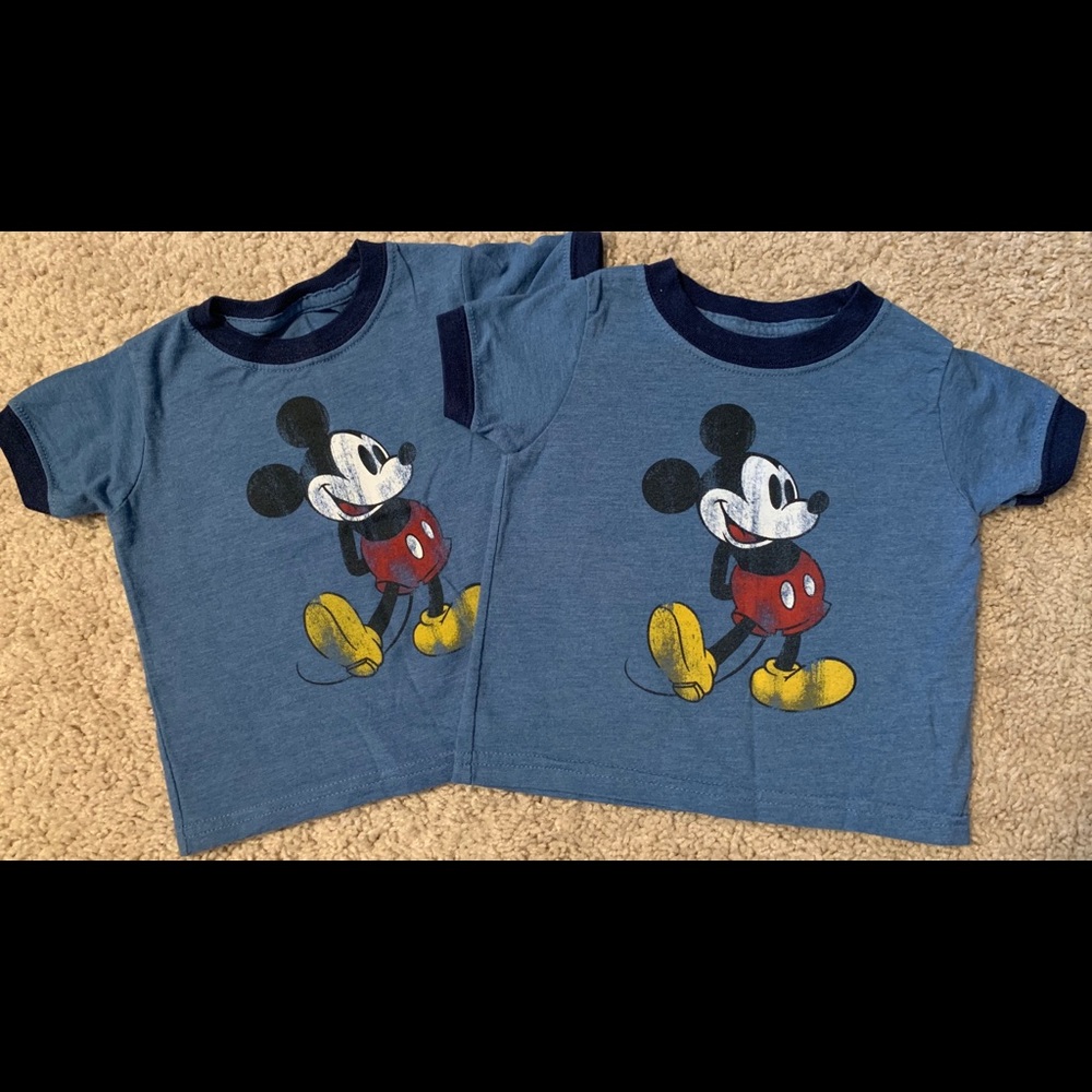 A pair of authentic Mickey T-shirts